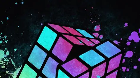 Neon paint-splattered Rubik's cube on black background